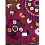 Uzbek Suzani embroidered and decorative tribal textile. Made in central Asian countries, Suzani is