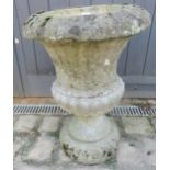 A nicely weathered reconstituted stone garden urn in a Grecian taste. Condition report: No issues