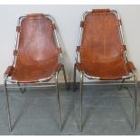 A pair of 1960s ?Les Arcs? chairs by Charlotte Perriand, the saddle brown leather hand stitched