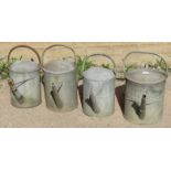 Four vintage galvanised 2 gallon and larger watering cans. Condition report: No issues H45cm (