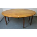 A 19th century pale mahogany oval drop-leaf hunt table, on square supports. Possibly Irish.