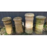 Four similar vintage cylindrical terracotta chimney pots/planters. Condition report: Signs of