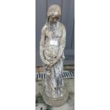 A nicely weathered reconstituted stone garden ornament in the form of a forlorn maiden. Condition