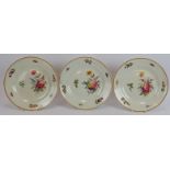 Three late 18th century hand decorated Spode plates with floral sprays and bug borders. Incise marks