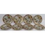 A set of 8 Japanese Satsuma ware plates each depicting processional scenes. 5 character marks to