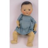 An antique Armand Marseille Bisque headed Chinese baby doll marked A M Ellar 3K. Height 31cm.