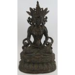 A large bronze Chinese Buddha seated on a lotus pedestal, some signs of gilding. Height 39cm. 6