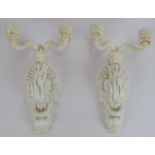A pair of 19th Century Copeland porcelain two branch wall sconces with moulded foliate design