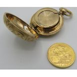A 1912 Edwardian gold sovereign in a yellow metal sovereign case 'gold cased guarantee to wear for