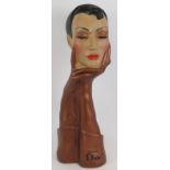 A large Art Deco style plaster advertising bust of a gloved lady bearing the Christian Dior logo.