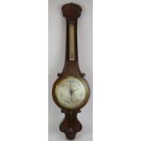 A William IV wheel barometer by Cicerimantica & Torre, Edinburgh. Walnut case and silvered dial.