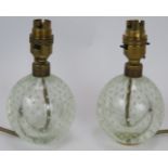 A pair of mid-century controlled bubble glass lamps, probably Whitefriars. Height 18cm. Diameter