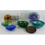 12 pieces of decorative studio glass including a wall clock, controlled bubble leaf dish in the