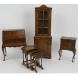 A four piece set of vintage miniature burr walnut furniture, possibly display items, comprising a