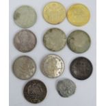An 1887 Mexican 20 reales coin, a 1930 Dutch 2.5 guilder coin and 9 other coins and medallions