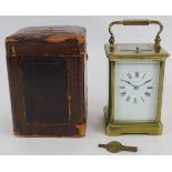 An antique Mappin & Webb Ltd brass repeater carriage clock with leather travel case. Movement No