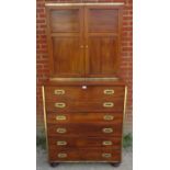 A 19th century camphorwood campaign secretaire bookcase with brass mounts, the bookcase with two