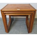 A set of three mid-century teak nesting tables, part of the Quadrille range by G Plan. Condition