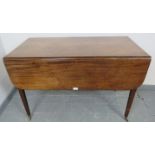 A Georgian mahogany Pembroke table with single drawer to one side and dummy drawer to the other,