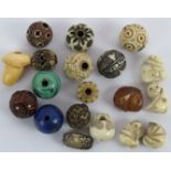 A collection of 19 Meiji period Japanese Ojime beads, mostly carved ivory plus glass, Lapis