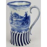 A late 19th century Doulton Burslem flow blue jug with pastoral windmill scene. Height 19cm.