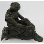 A James Pradier (Swiss/French 1790-1852) bronze figure of a classical female minstrel with lyre.