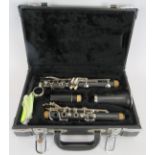 A DY Musical Design in America clarinet in fully fitted case with spare reeds. Condition report: