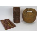 A carved bamboo Chinese brush pot, a carved wood Chinese 'bell' and a wooden abacus. Brush pot 25cm.
