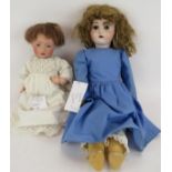 An antique German Bisque headed Hilda doll marked Kestner 245 and a Kestner 136/10 doll in blue
