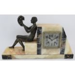 A French onyx Art Deco striking mantel clock by Courtin-Lecrosnier with classical female figure