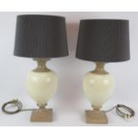 A pair of Valsan ceramic balluster form lamps with crackle glaze bodies and pleated shades.