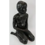 A large bronzed figure of a crouching child, almost life-sized, unsigned. Height 63cm. Condition