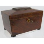 A small 19th century rosewood tea caddy with working lock and carved wood caddy spoon. 20cm x 12cm x