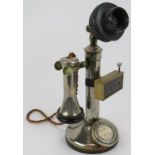 An early chrome plated candlestick telephone with attached 'Foncheck' recorder. Height 33cm.