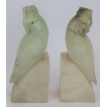 A pair of period Art Deco green alabaster cockatoo bookends. Height 19cm. (pr). Condition report: