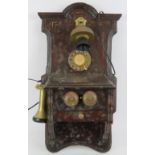 A vintage style British Ericsson wall phone on oak mount with brass fittings and BT compatible