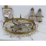 A large pendant drop gilt and crystal chandelier (47cm diameter), and three crystal wall lights, one