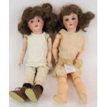 Two antique Bisque headed dolls, one marked S.F.B.J. Paris, the other SPBH 1909 Germany. Tallest
