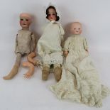 An antique Armande Marseille baby doll in period cotton gown, and two Heubach German dolls, one with