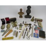 A mixed lot of minor collectables including a bust of Kitchener, 2 sovereign cases, opera glasses,