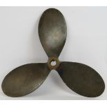 A vintage bronze three bladed boat propeller stamped 17-11, radius 22cm. Condition report: Aged