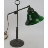 A good quality vintage style rise and fall banker's lamp with green shade and patinated bronze body.