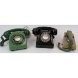 Three vintage dial telephones including a two tone green trim phone. (3). Condition report: