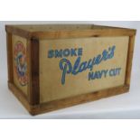 A 1950s John Player's Navy Cut cigarette crate, wooden framed with cardboard sides and base. 65cm