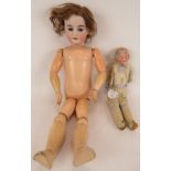A large antique German Bisque headed doll with jointed wooden limbs (no maker) and a Heubach