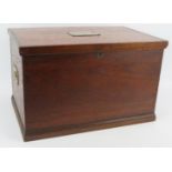 A small oak campaign trunk with brass flush handles, engraved name plate and working lock and key.