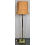 A vintage gilt metal standard lamp on a square onyx plinth base with ball feet. Condition report: