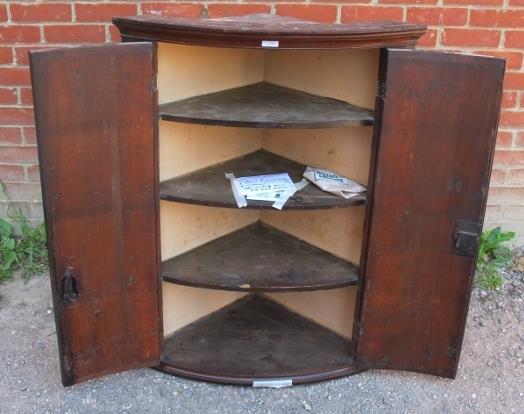 A George III mahogany bow fronted corner cupboard, with crossbanded inlay, housing four fitted - Image 3 of 3