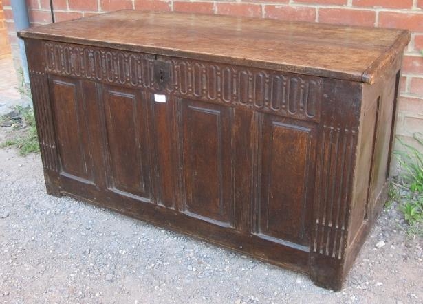 A 17th century oak coffer, with chisel carved frieze and internal candlebox, the fielded front - Image 2 of 3