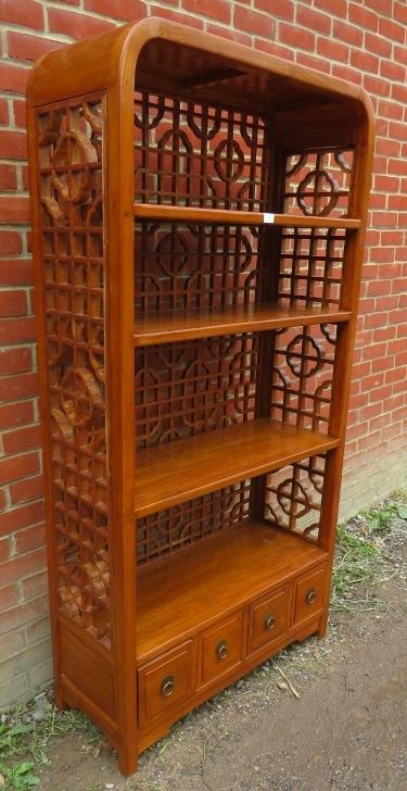 A contemporary Chinese hardwood open bookcase of four shelves, with open fretwork to sides and - Image 2 of 2